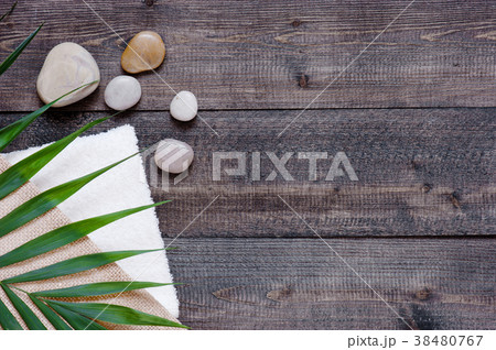Brown wooden background with terry towel 38480767