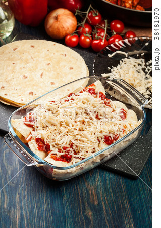 Traditional mexican enchiladas with chicken meat 38481970