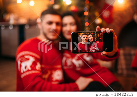 Love couple makes selfie, xmas celebration 38482815