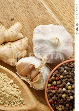 Composition of powder spices on spoon and 38483702
