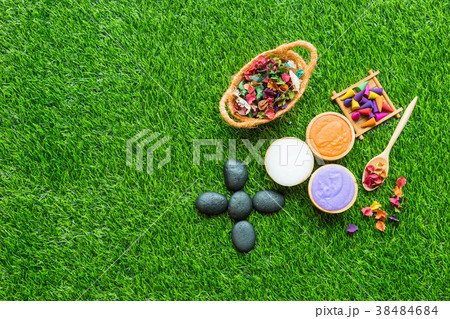 Massage item setting on green grass Background Massage item setting on green grass Background 38484684