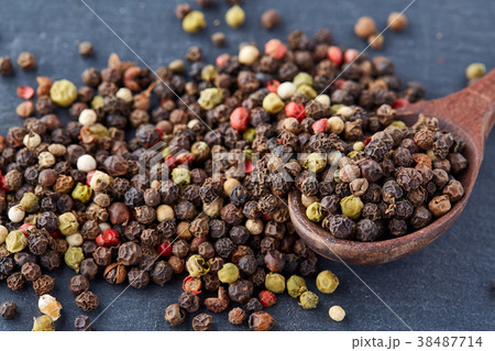 Top view on composition of peppercorns in wooden Top view on composition of peppercorns in wooden 38487714