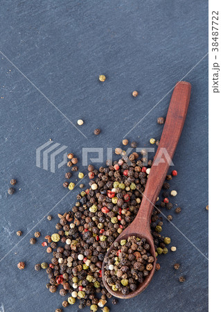 Top view on composition of peppercorns in wooden Top view on composition of peppercorns in wooden 38487722