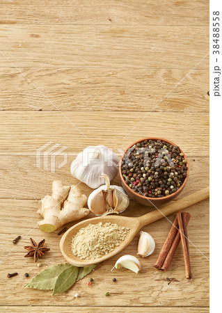 Composition of powder spices on spoon and Composition of powder spices on spoon and 38488558