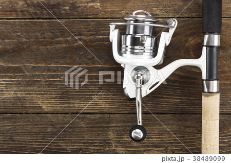 Fishing feeder and reel. space for text. 38489099