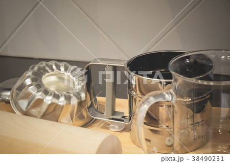 Wooden Rolling Pin, Measuring Cup and Cake Mold Wooden Rolling Pin, Measuring Cup and Cake Mold 38490231