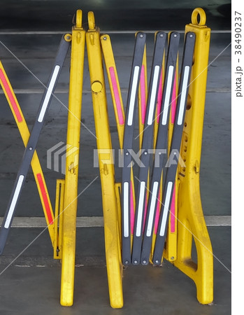 Yellow Portable Plastic Barriers Blocking The Road Yellow Portable Plastic Barriers Blocking The Road 38490237