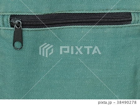 Close Up of Zipper on Green Bag background 38490278