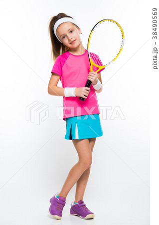 Cute little girl with tennis racket in her hands Cute little girl with tennis racket in her hands 38490569