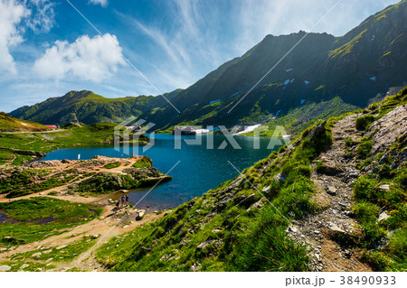 lake Balea in Fagaras mountains on a bright sunny lake Balea in Fagaras mountains on a bright sunny 38490933