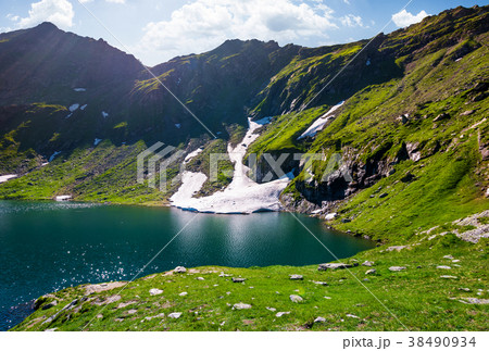 lake Balea in Fagaras mountains on a bright sunny 38490934
