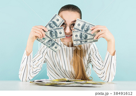 Attractive woman with cash 38491612