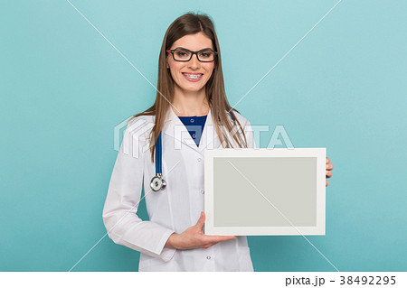 Female brunette doctor in glasses with frame Female brunette doctor in glasses with frame 38492295