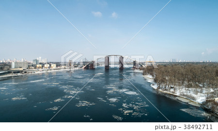 Rusty unfinished bridge in Kiev, Ukraine. Combined 38492711
