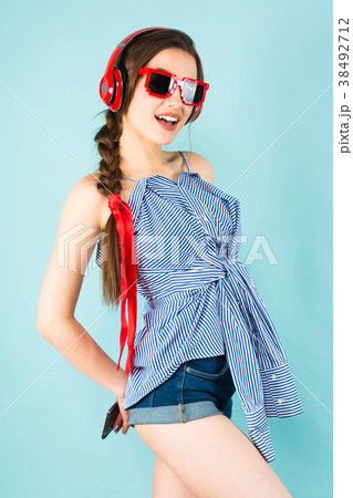 Young sexy woman with headphones Young sexy woman with headphones 38492712