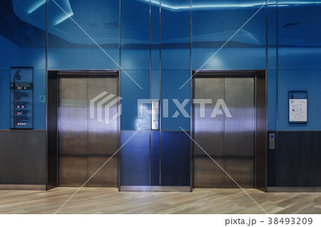modern elevator with closed doors in lobby 38493209