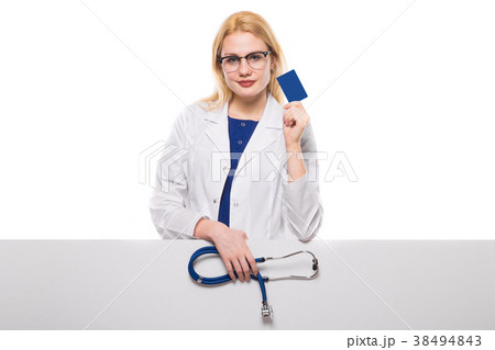 Woman doctor with stethoscope and business card 38494843