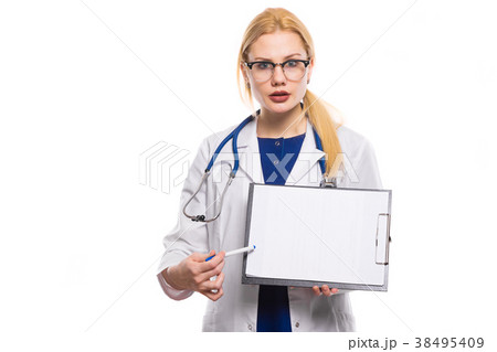 Woman doctor in white coat with clipboard 38495409