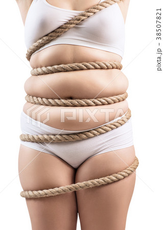 Fat woman in white underwear twisted with a rope. 38507821