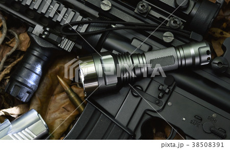 Tactical flash light and assault rifle gun weapon. Tactical flash light and assault rifle gun weapon. 38508391