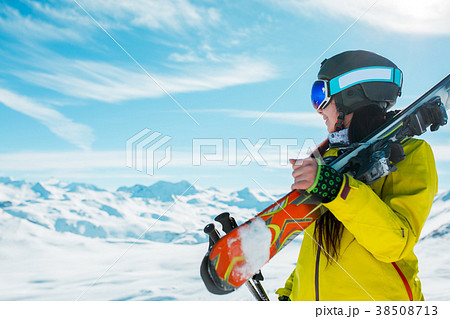 Photo of side view of sporty woman in helmet with 38508713