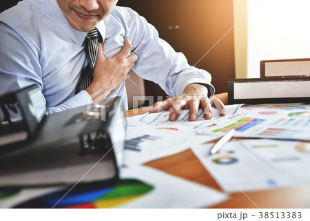 Businessman having heart attack. Businessman having heart attack. 38513383