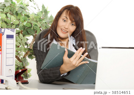 Young woman is shocked by what she sees in the document Young woman is shocked by what she sees in the document 38514651