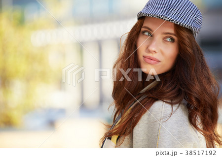 Woman in autumn city 38517192