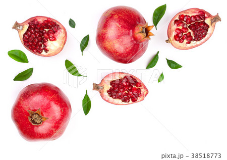 pomegranate with leaves isolated on white pomegranate with leaves isolated on white 38518773