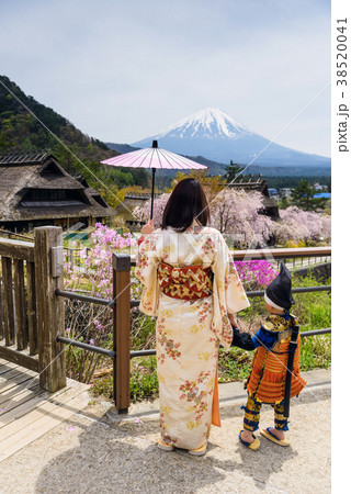 Japanese dress family with Sakura and mt. fuji Japanese dress family with Sakura and mt. fuji 38520041
