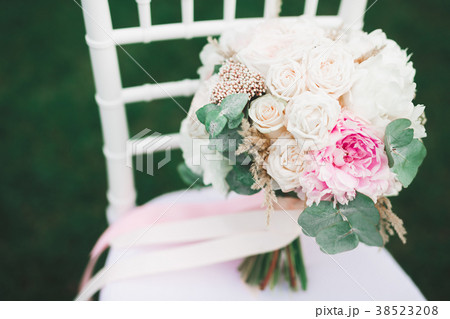 Beautiful wedding bouquet with different flowers Beautiful wedding bouquet with different flowers 38523208
