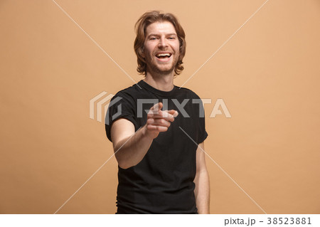 The happy business man point you and want you 38523881