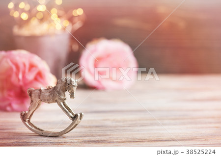 Pink roses, rocking horse Pink roses, rocking horse 38525224