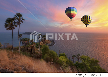 Hot air balloon flying over Phromthep cape 38529158