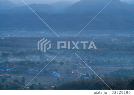 Aerial view of Pai city covered with fog Aerial view of Pai city covered with fog 38529190