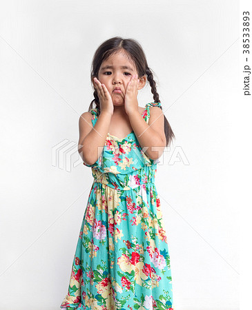 asian girl play her face with hand asian girl play her face with hand 38533893