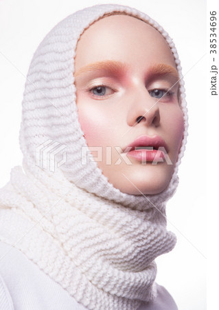 Young woman in creative image with artistic make 38534696