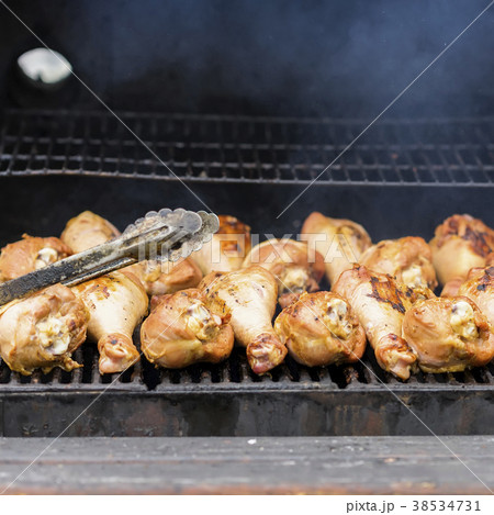 Appetizing turkey drumsticks on the grill, on Appetizing turkey drumsticks on the grill, on 38534731