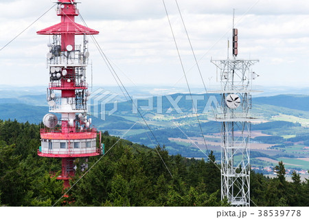 Two telecommunication towers communication 38539778