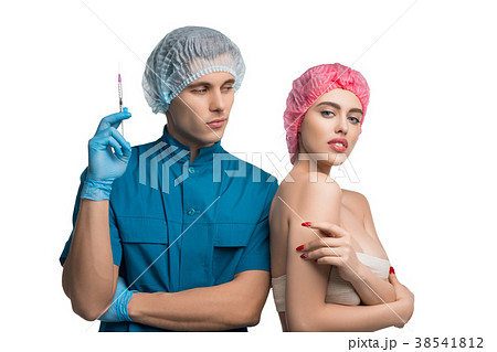 Plastic surgeon with his beautiful patient shot 38541812
