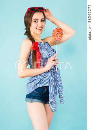 Young sexy woman with lollipop Young sexy woman with lollipop 38542272