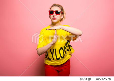 Blonde woman in bright clothes 38542570