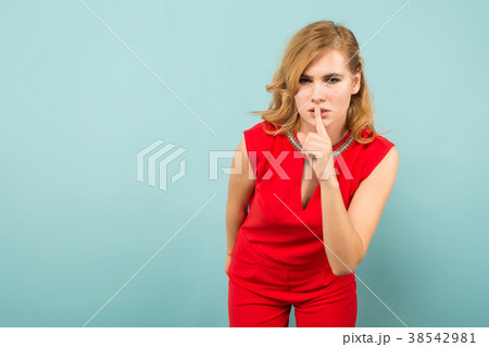 Attractive blonde woman in red overalls 38542981