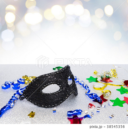 Mask with masquerade decorations 38545356