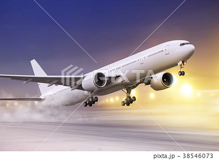 white plane in winter blizzard 38546073