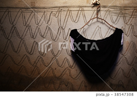 black underwear on hanger and dirty cement wall black underwear on hanger and dirty cement wall 38547308