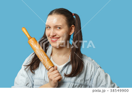 woman with rolling pin woman with rolling pin 38549900