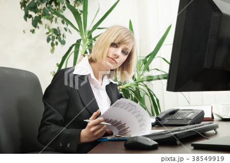 Woman working with computer in the office 38549919