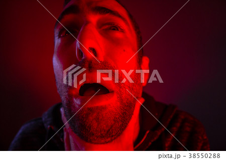 Depressed stressed man strangling himself Depressed stressed man strangling himself 38550288