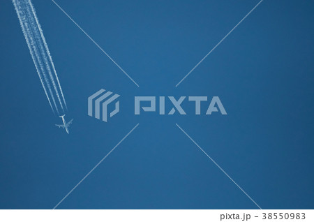 One plane fly on blue sky background One plane fly on blue sky background 38550983